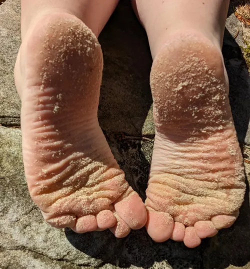 Sandy toes and soles