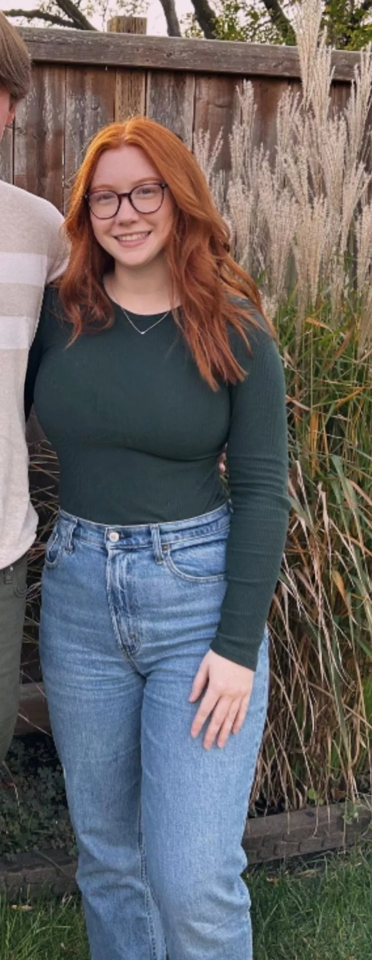 Green Sweater Can't Hide Those Beauties 