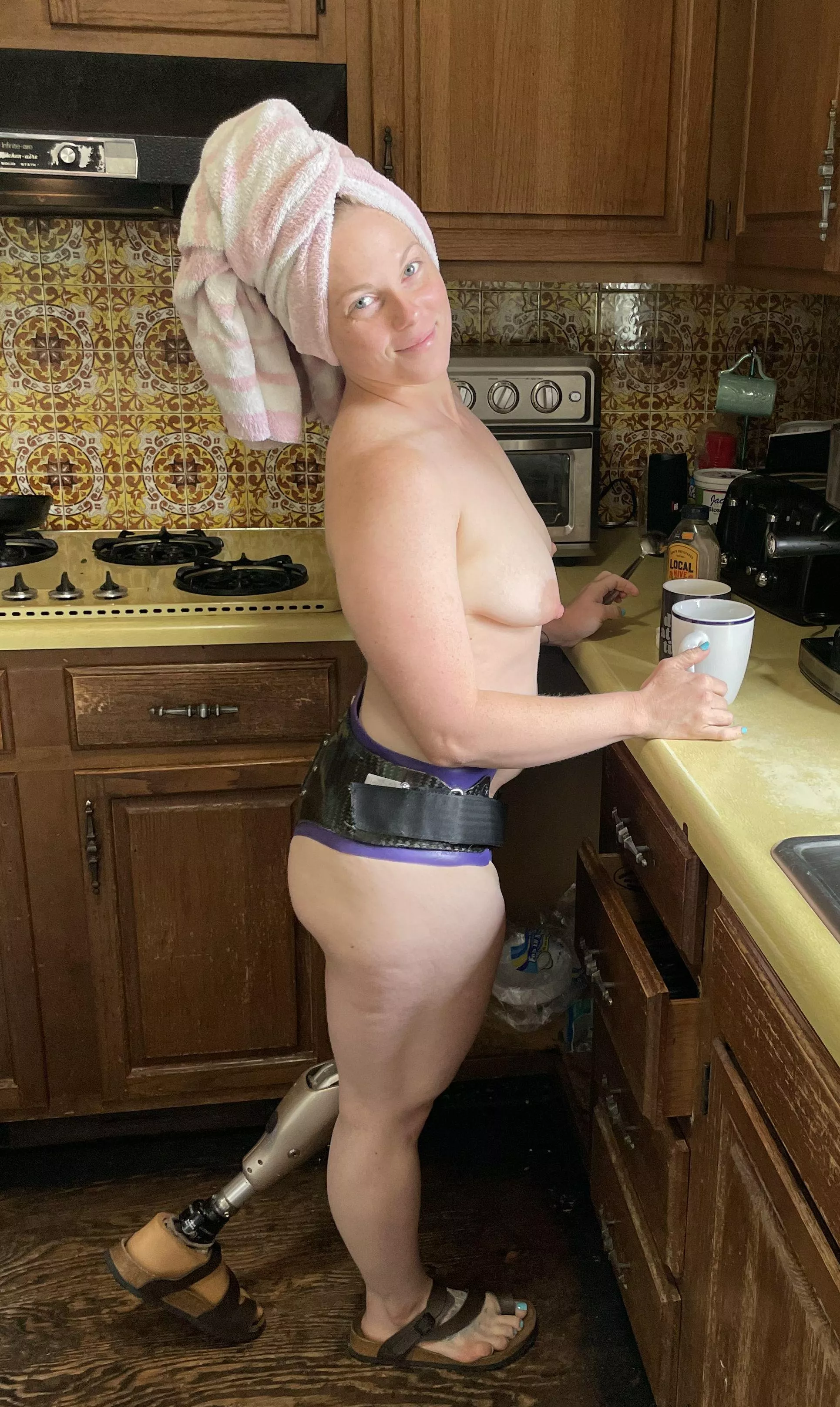Cyborg milf making her morning coffee