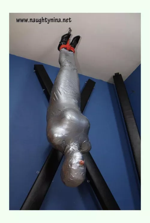 Fantasy #861 utter helplessness. I know being upside for extended periods of time can be very dwngerous but man I would love to be upside down and wrapped, losing all sense of spatial feeling, bonus for ear plugs so I can't hear anything.