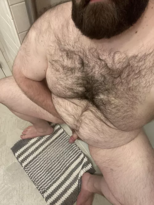 Sitting on the side of the tub, waiting for you