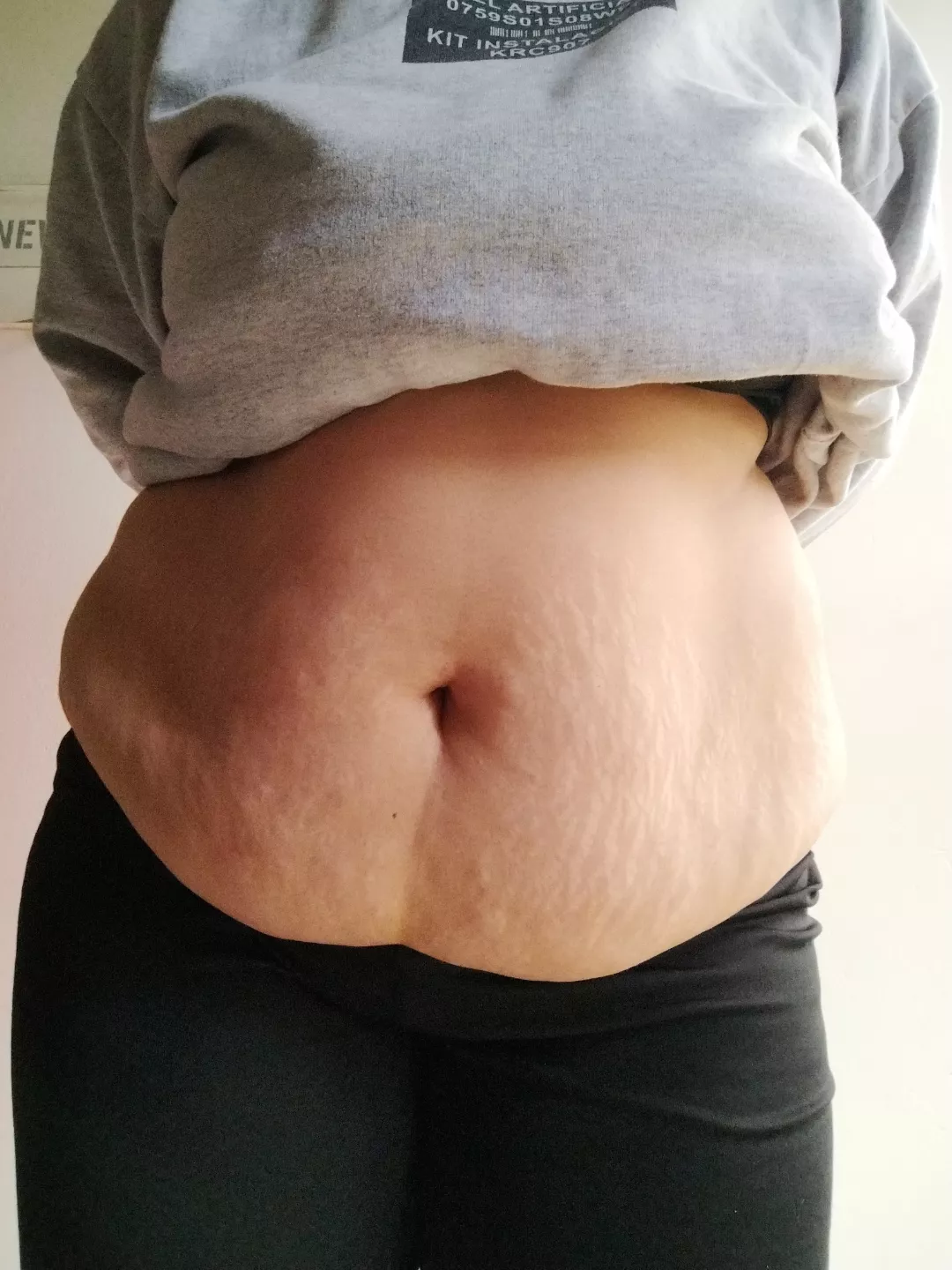 in front a big belly with delicious tits