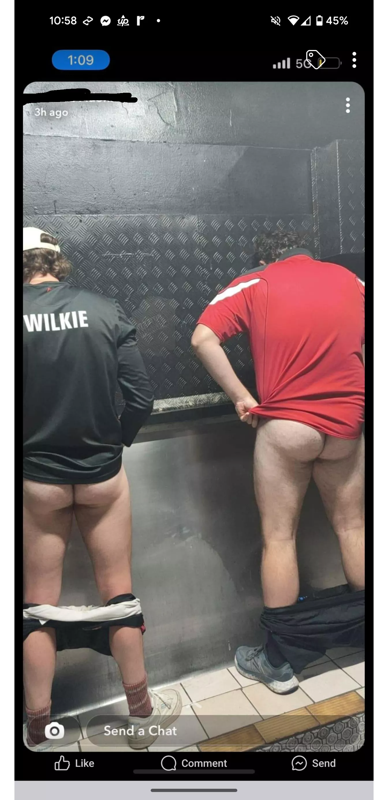 Fellas pissing together