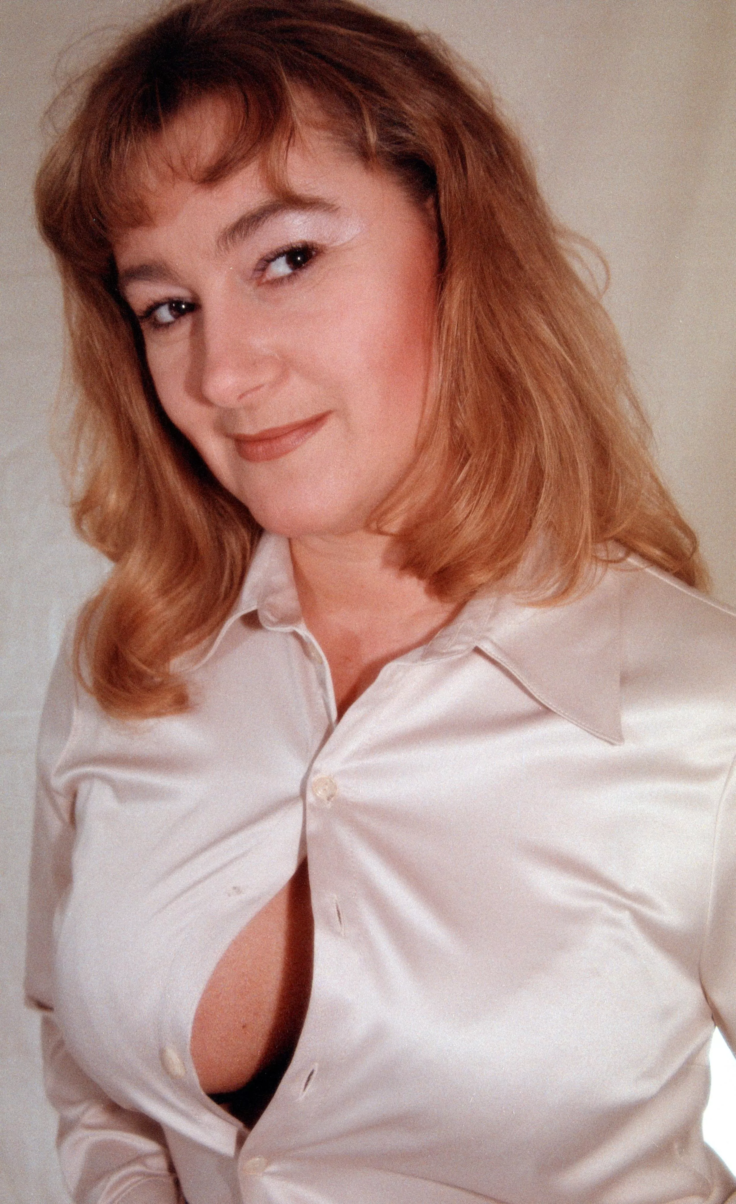 Busty Redhead MILF Secretary Wife Tits have no mercy with the tight Satin Blouse