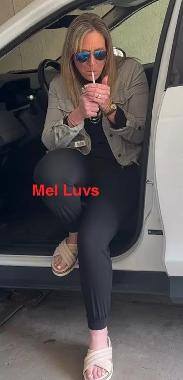 Just a MILF lighting up in her SUV