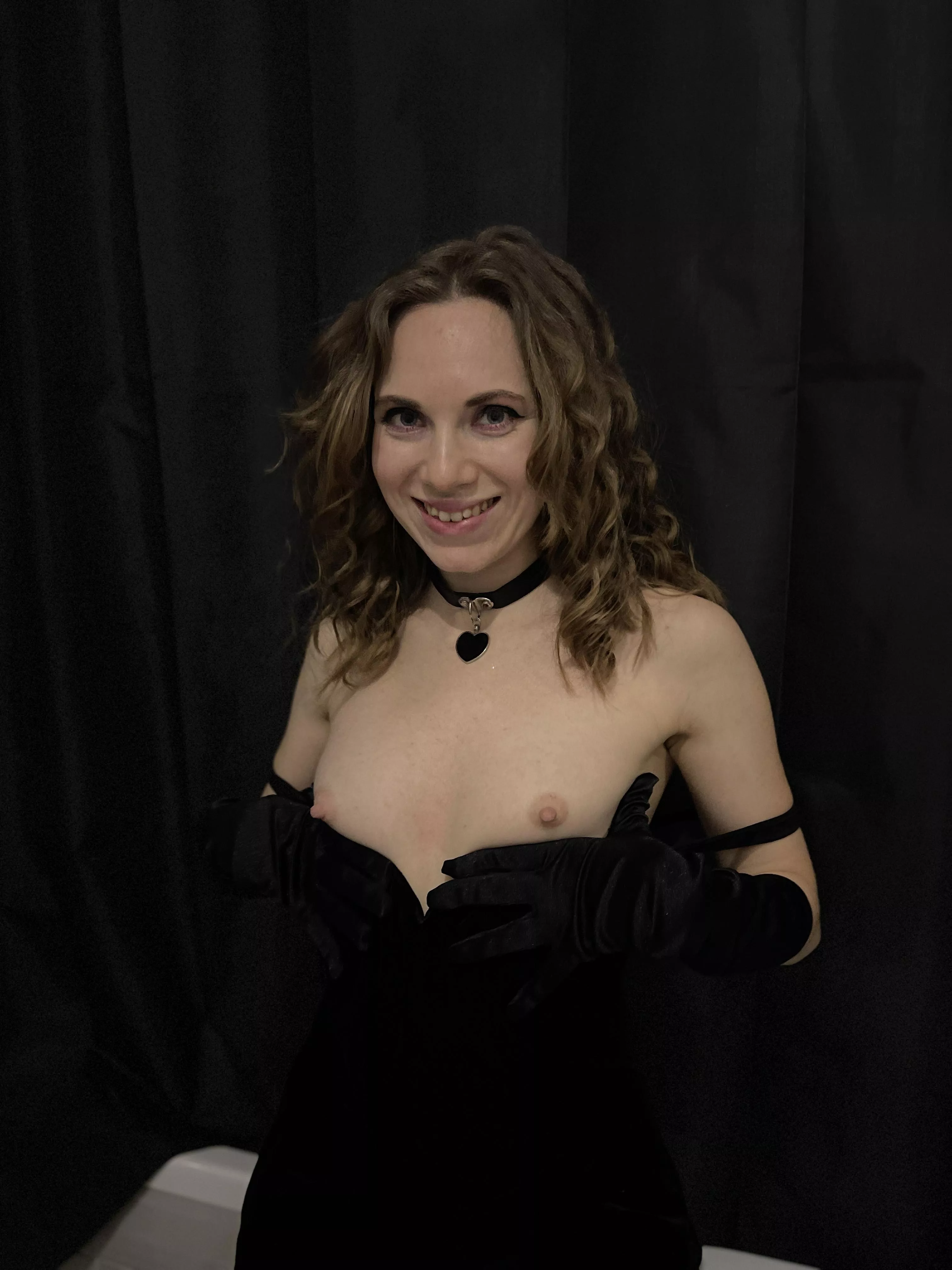 Caress my breasts while looking at me