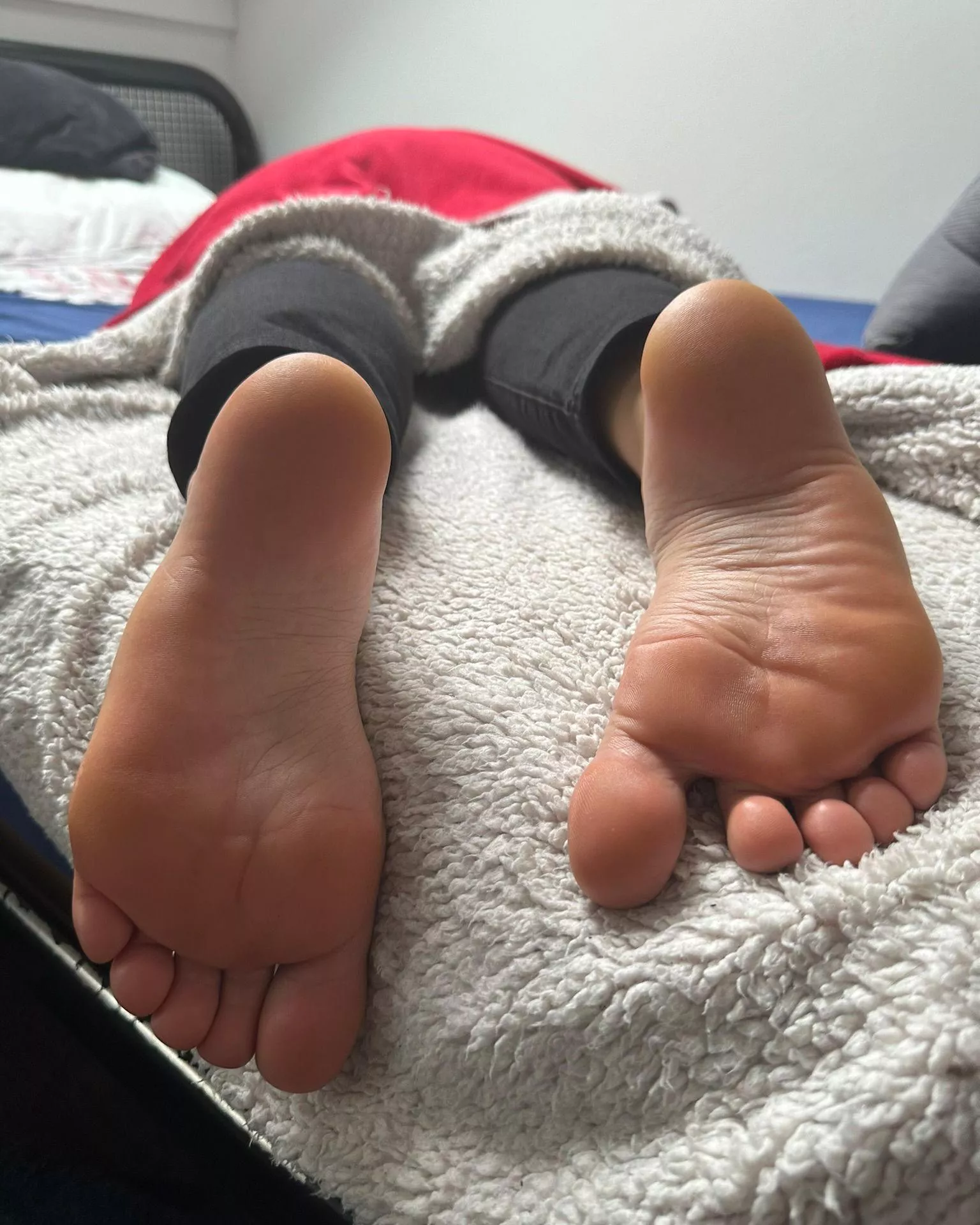 My soles are at the edge of the bed... what's your move?