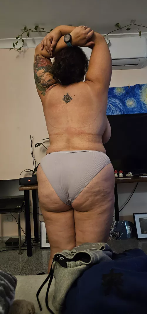 The wife stretching before bed