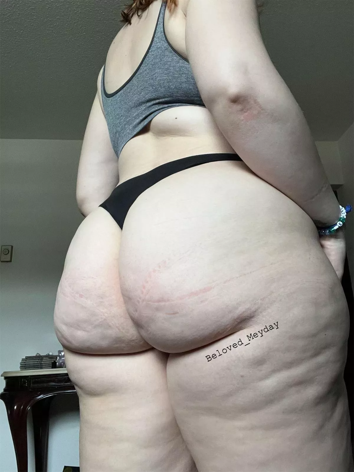 A booty with dimples and marks