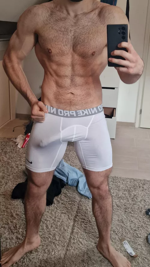 Pull down my sweaty Nike comptression shorts.