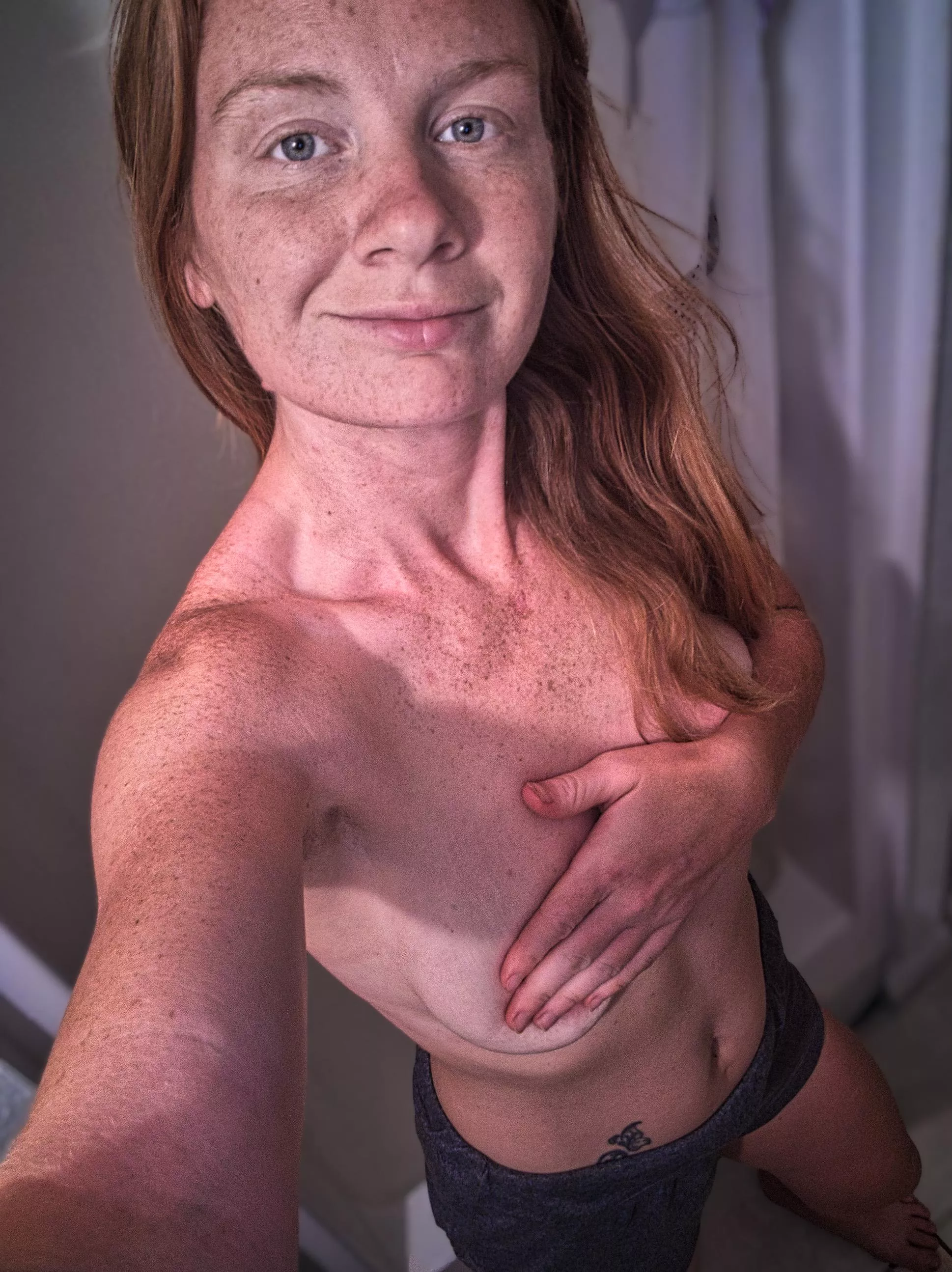 All natural, the carpet matches the drapes👙