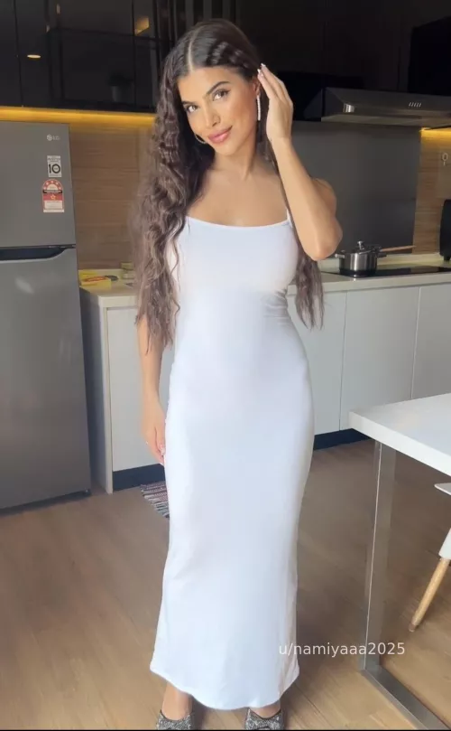 Dark angel in a white dress