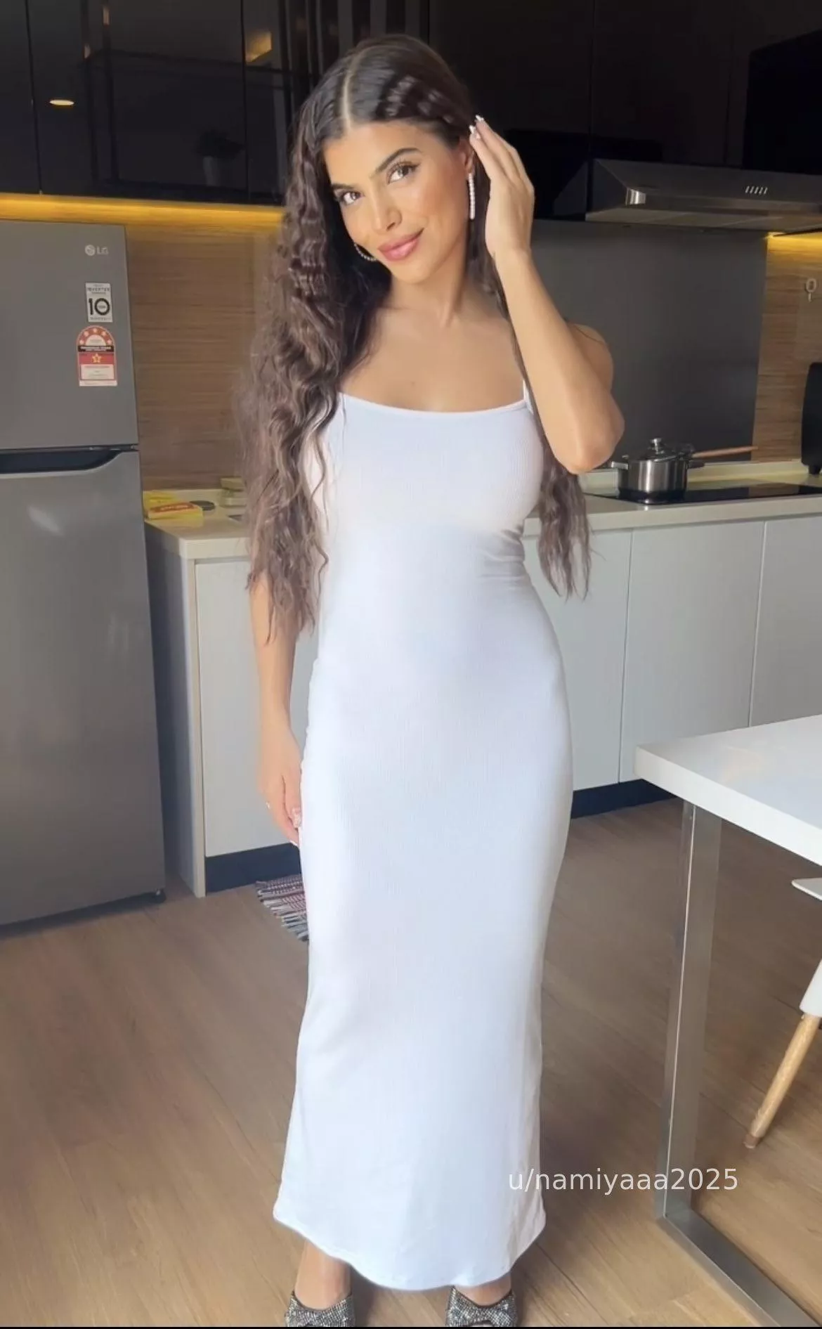 Dark angel in a white dress