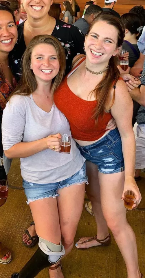 The ultimate power move, make the other girl hold your giant tits up for you.