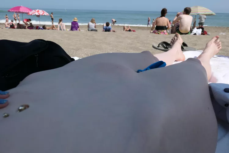 My husband untied the strings of my bottom and exposed my mound