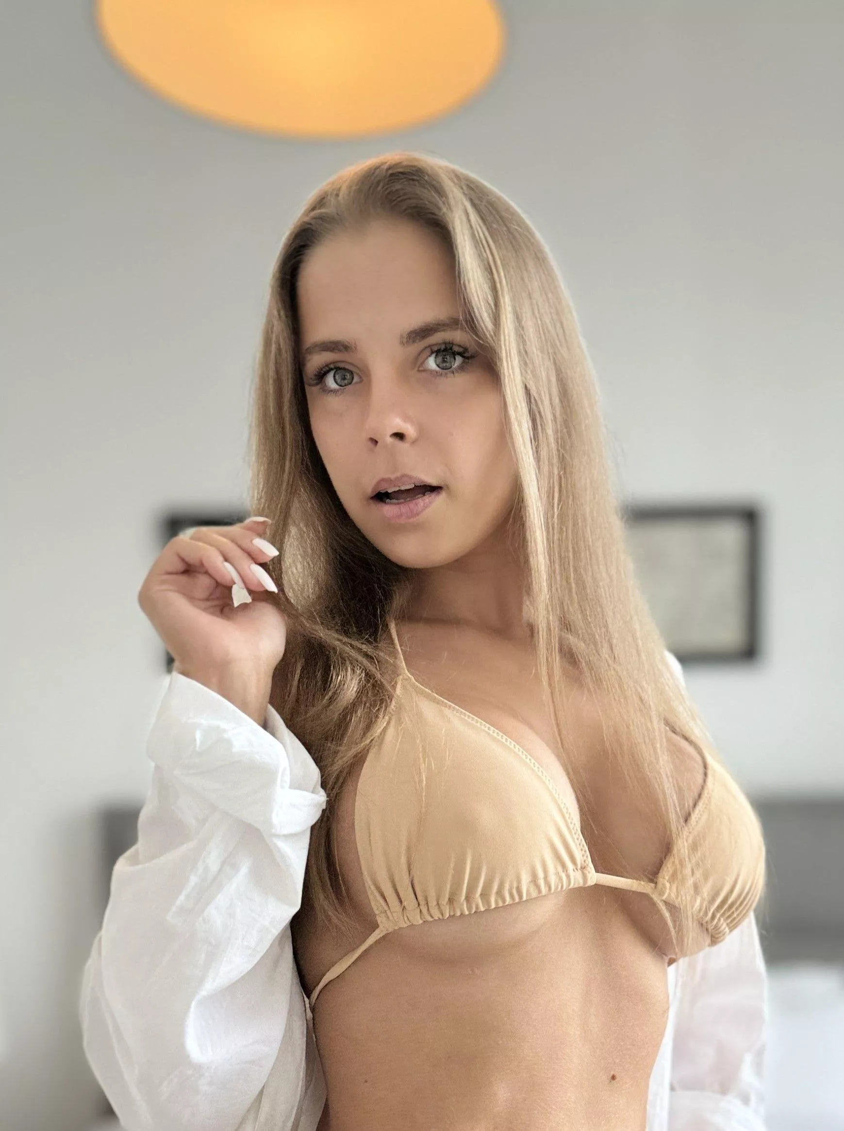 Surprised at the reflection in the mirror