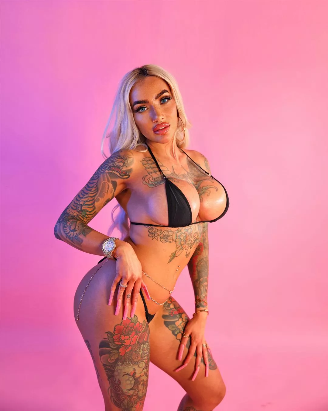 Tattooed long nails bimbo enhanced for your pleasure