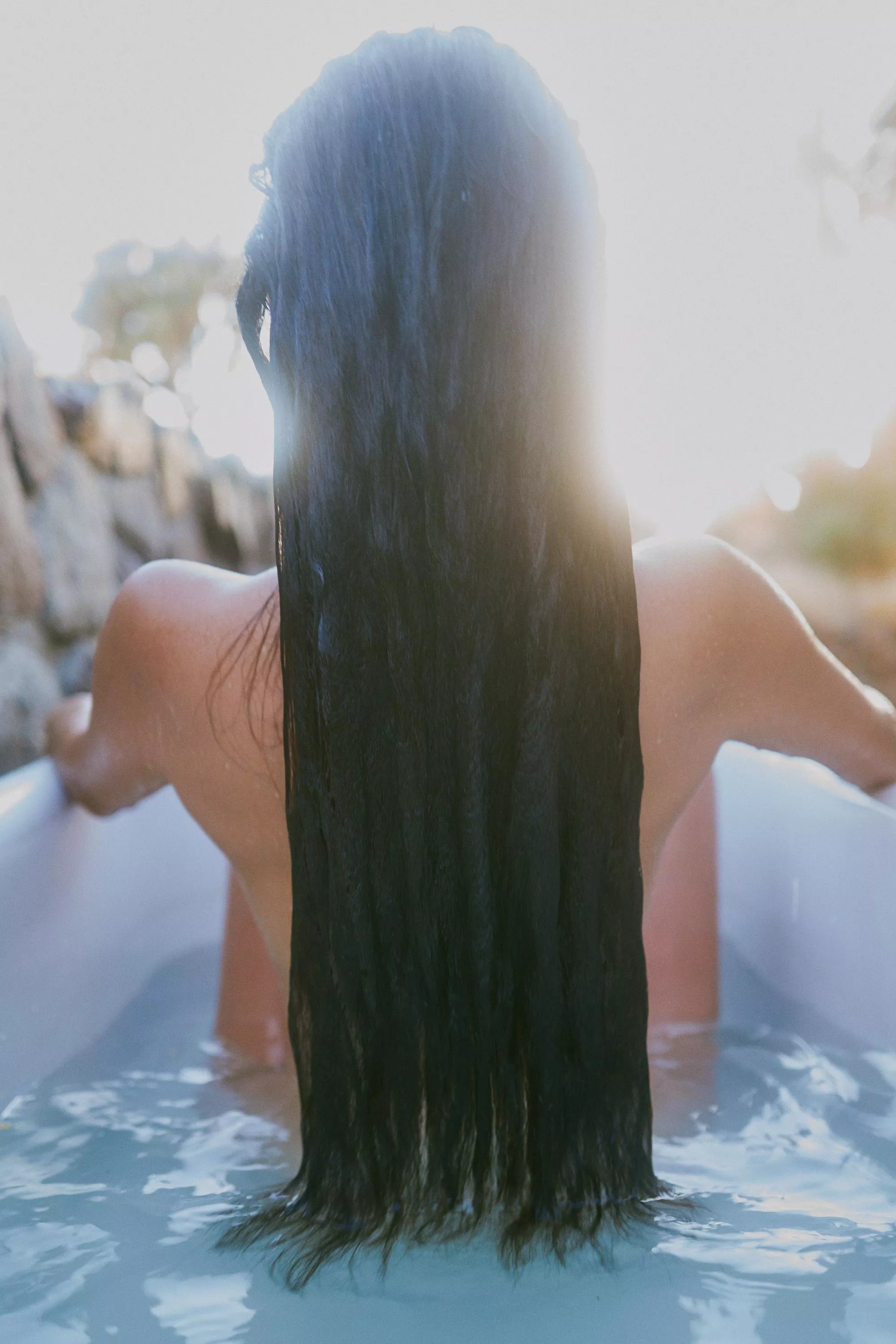 Wet, thick hair in pure morning air.