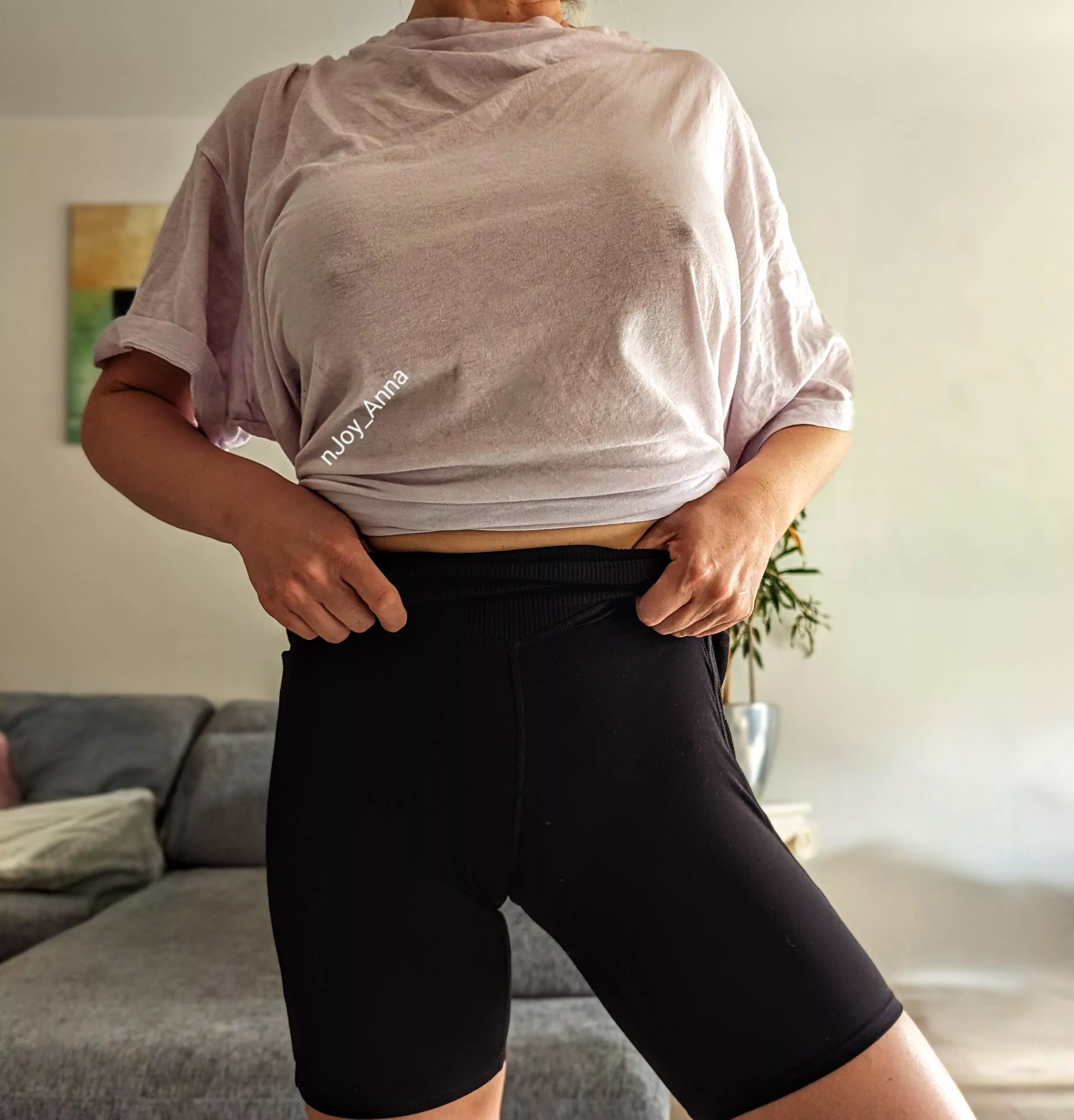 A thin worn cotton shirt without a bra feels so great