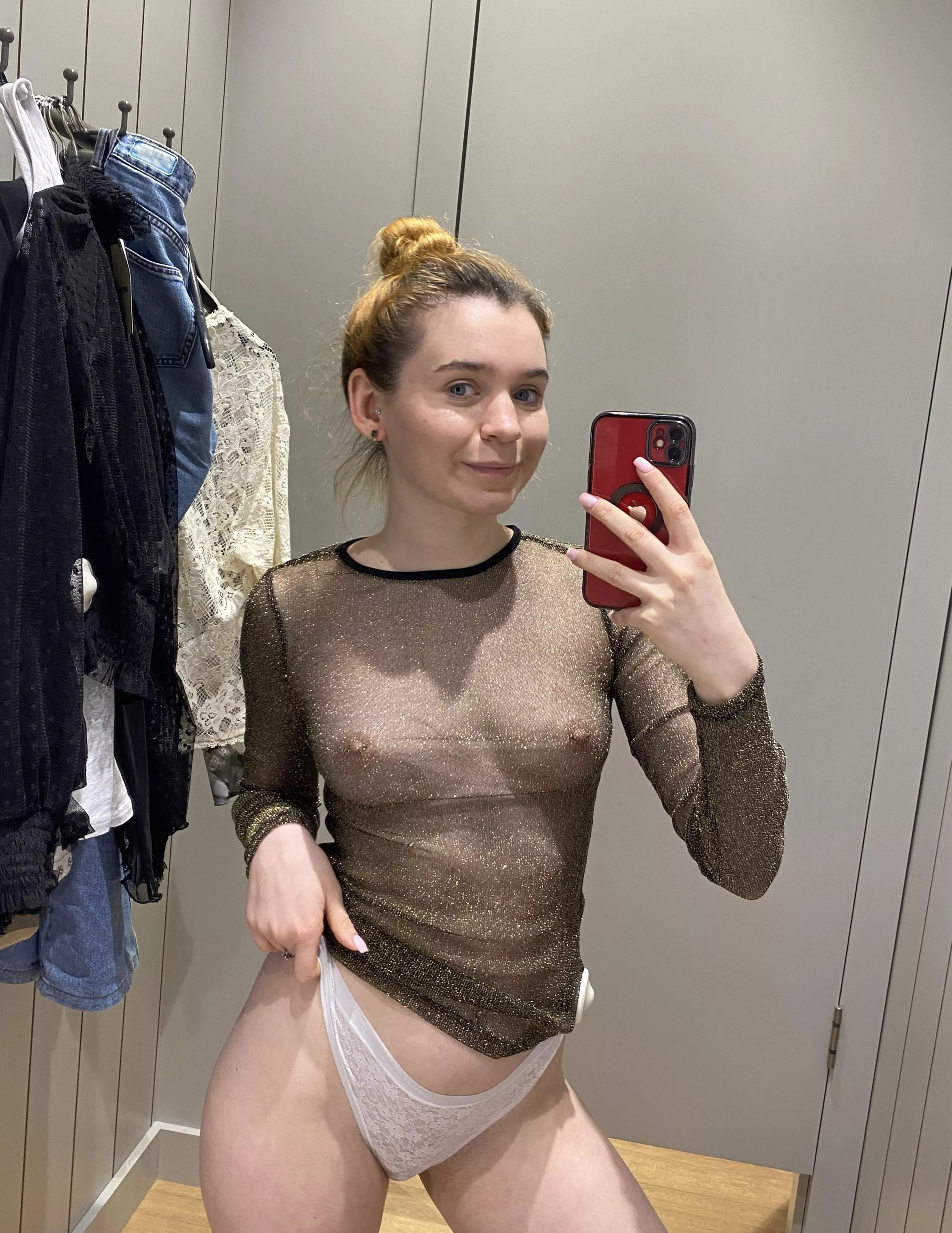 Why not take a peek in the fitting room? Who knows, you might just discover your new favorite look in there