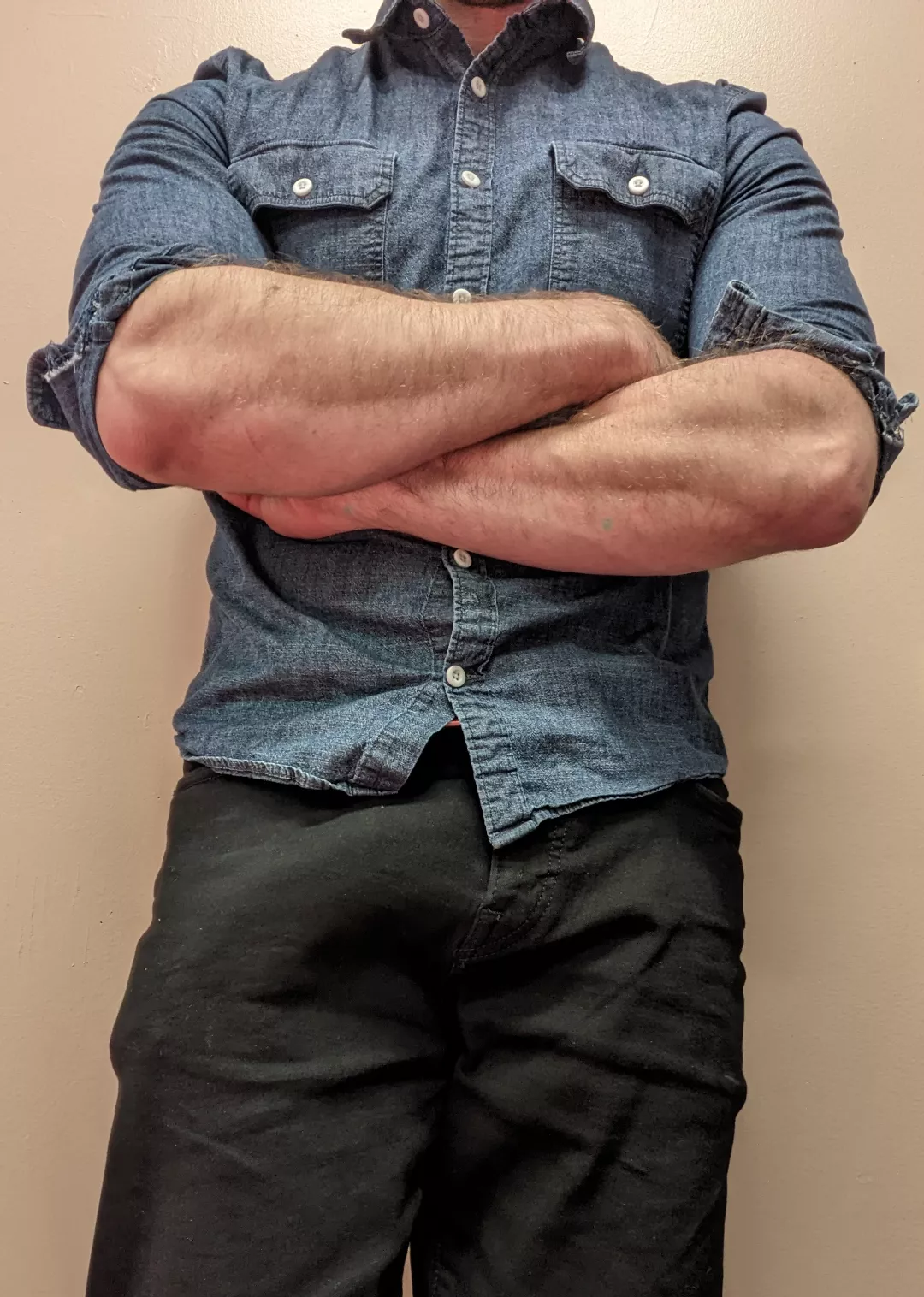 A lot to stare at in this pic, bulging forearms and...well, you know.