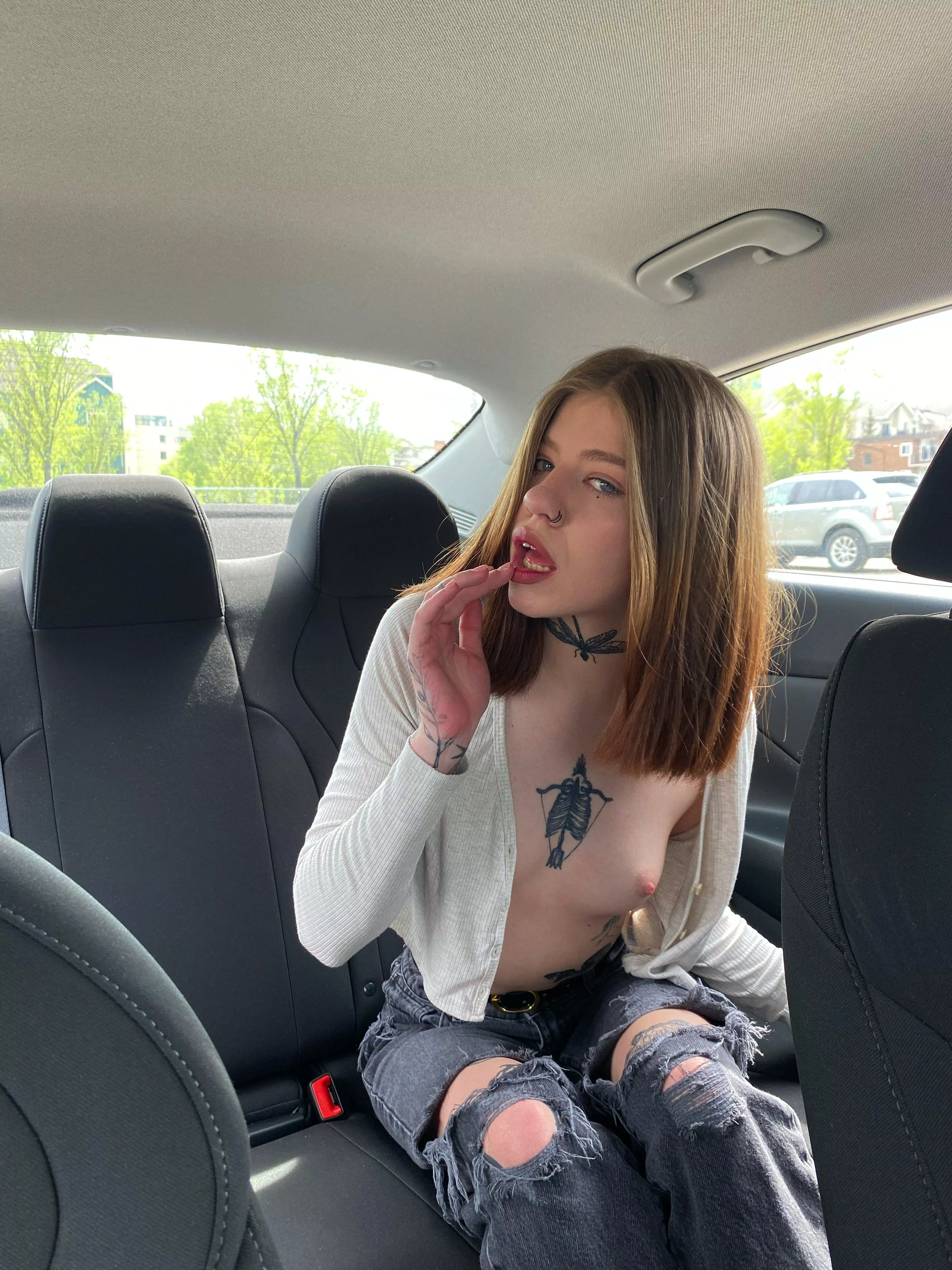 I couldn't wait to get home, so I showed my tits to my friend in the car