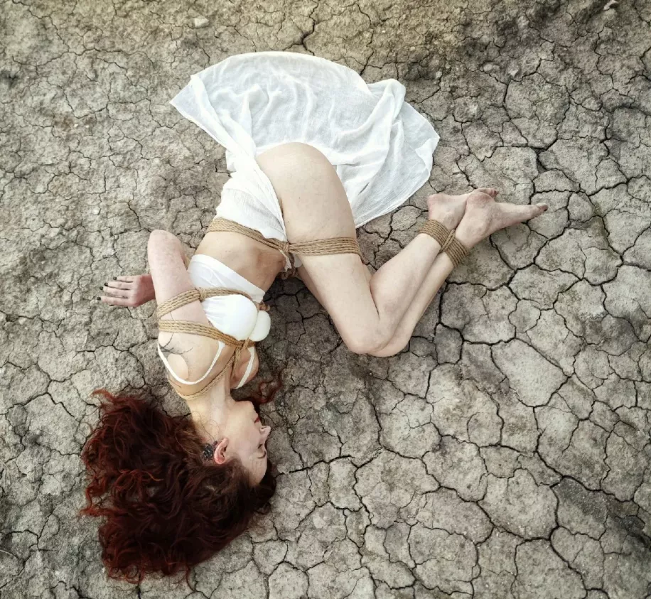 Needing help identifying tie around her waist and thighs please! Thanks