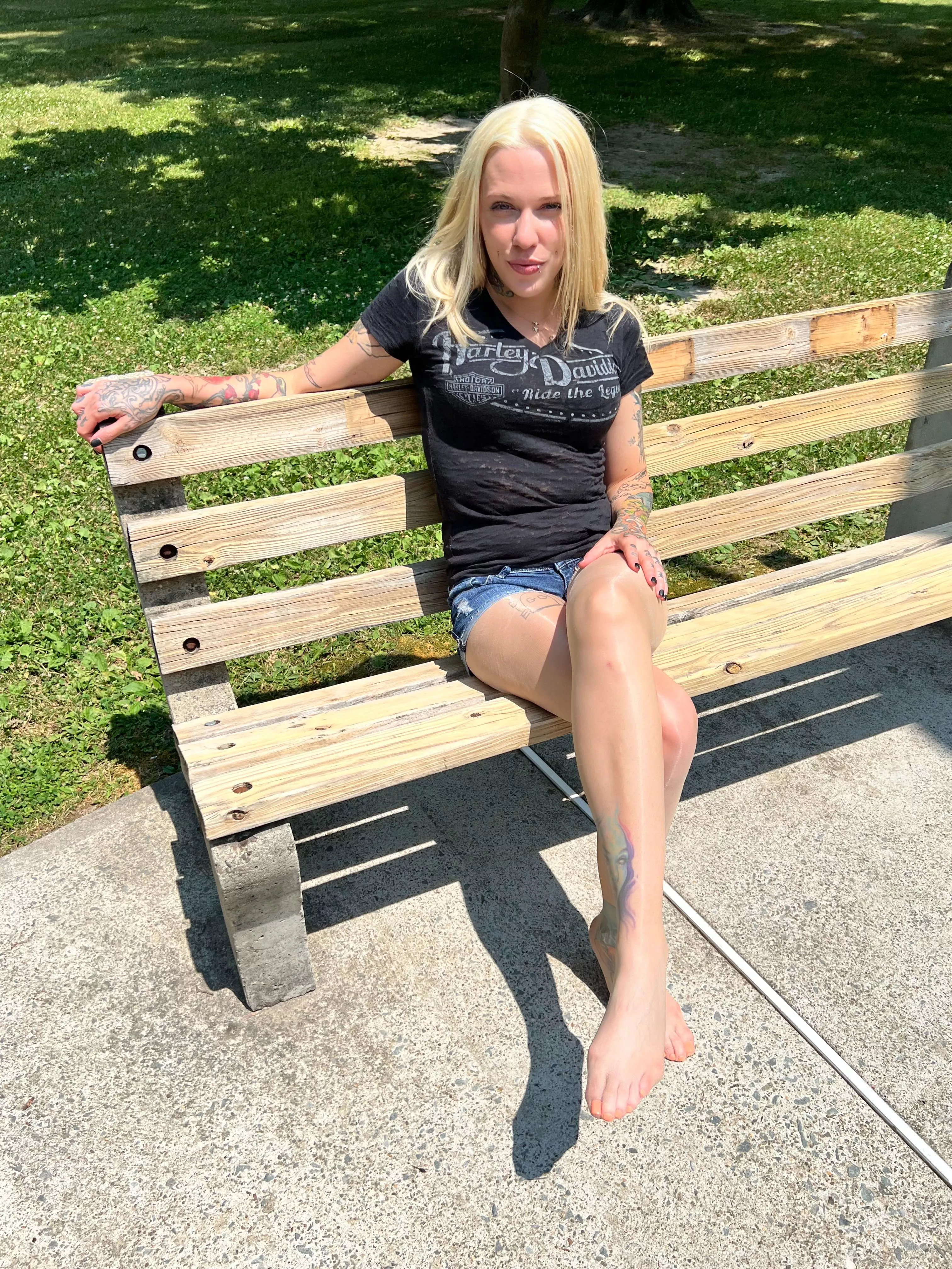 Sheer glossy tights in the park