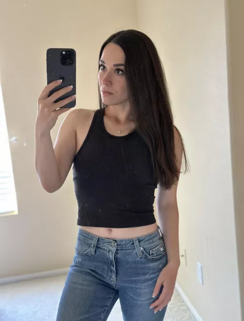 You can never go wrong with a crop top and some denim. 