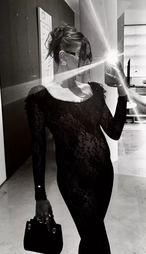 Pregnant Hailey Bieber in black dress 