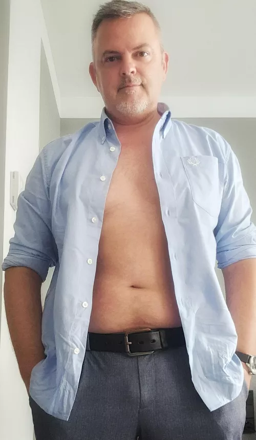 On request, the shirt is now open more than one button