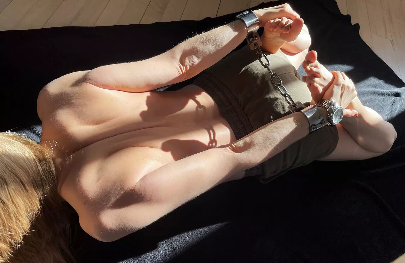 Enjoying my shackles and the sun on my skin