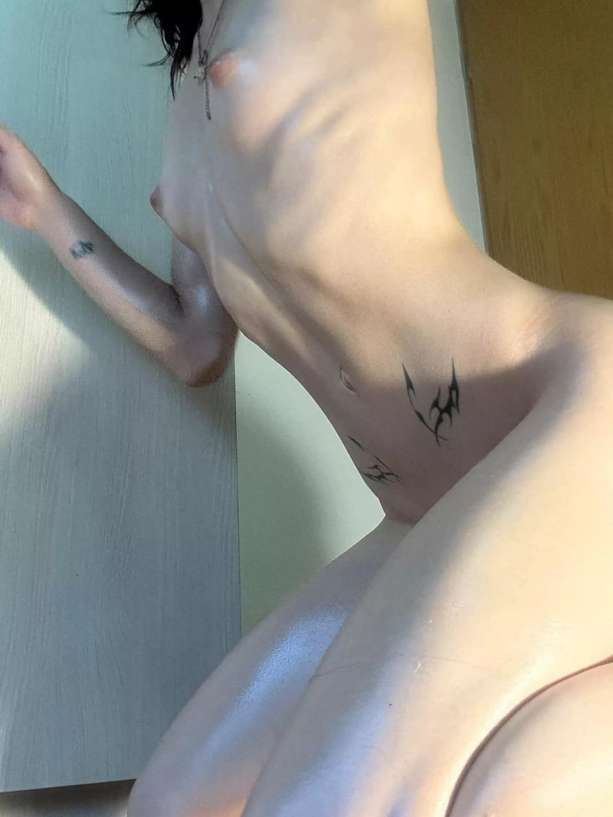 I bend over for you to see the beauty of my ribs