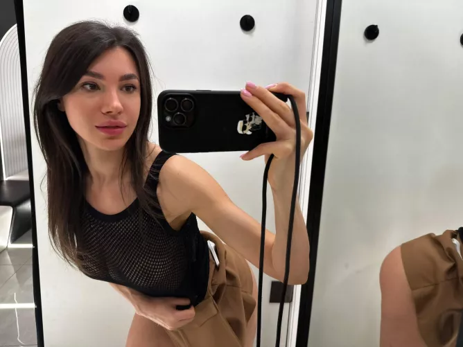 Trying on a sexy skirt in the store for you