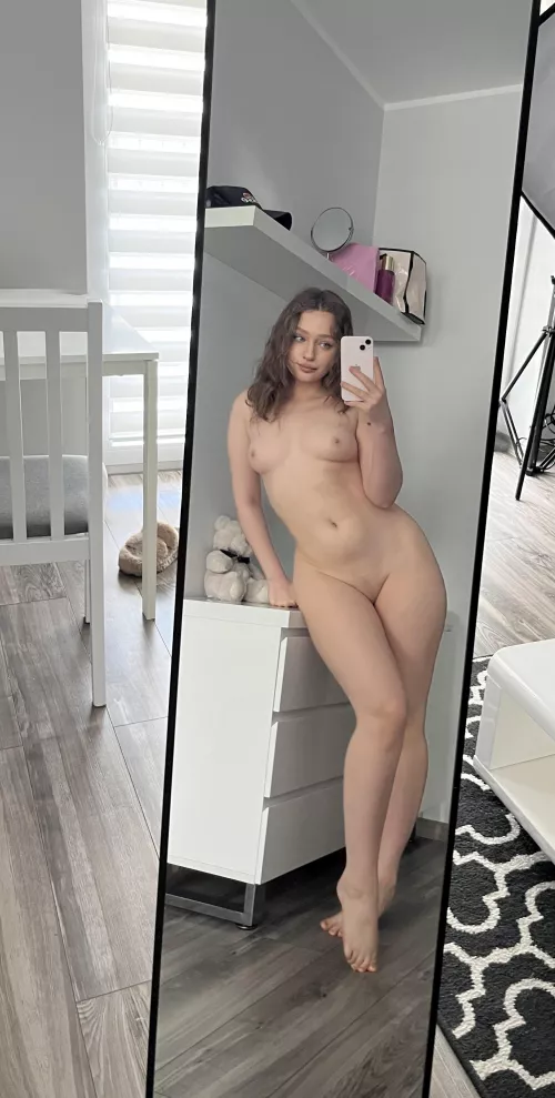 A beautiful girl in a beautiful mirror