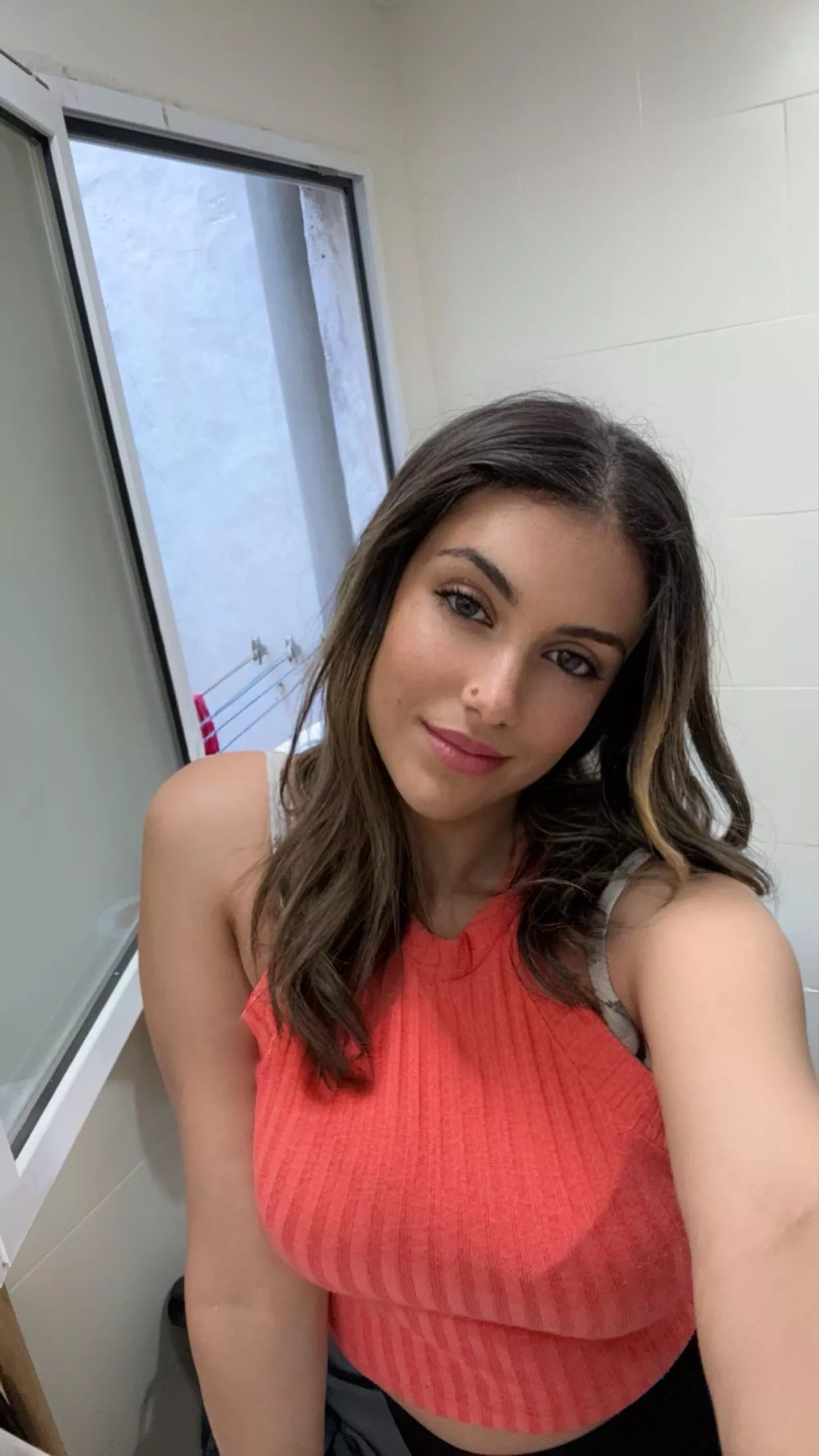 Cutie patootie on her phone, crashing this sub haha