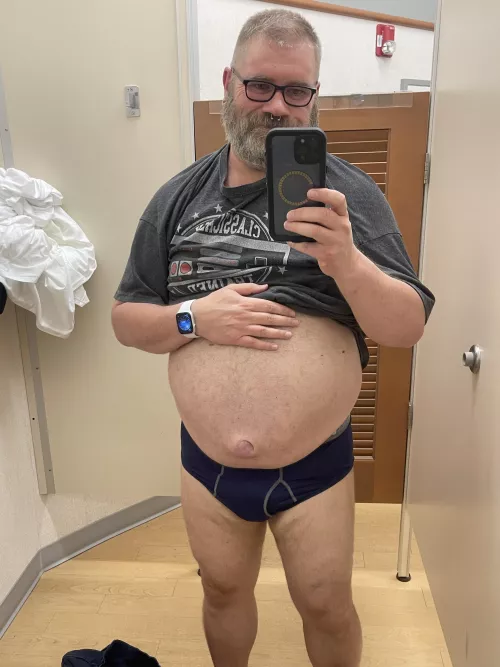 Trying on some clothes. 