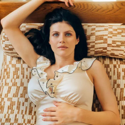 Alexandra Daddario laying down 