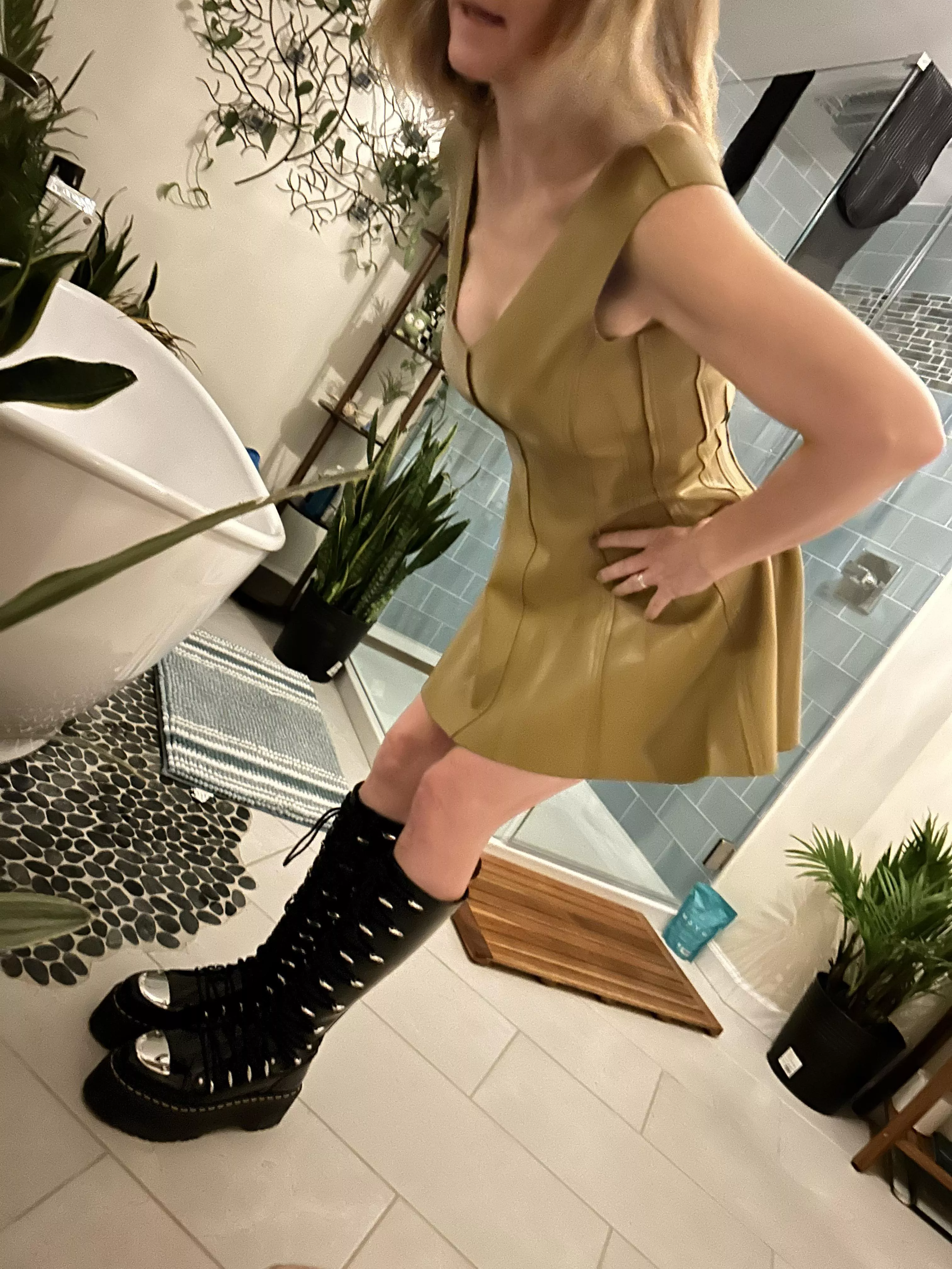47 and making sure this favorite dress and boots work