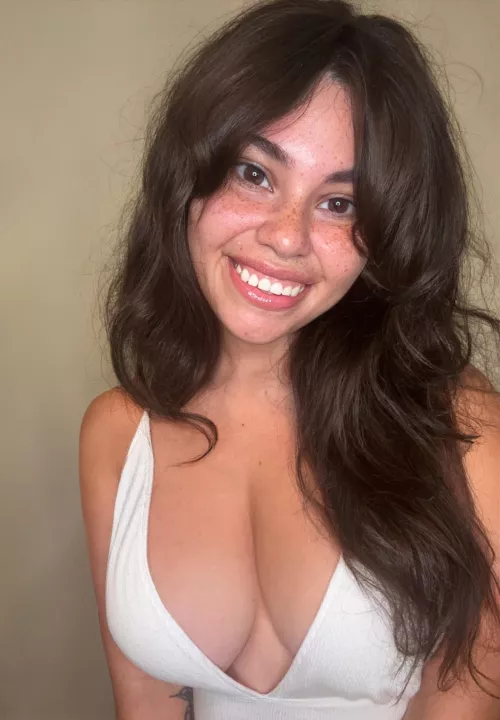 Just a braless brunette with freckles 