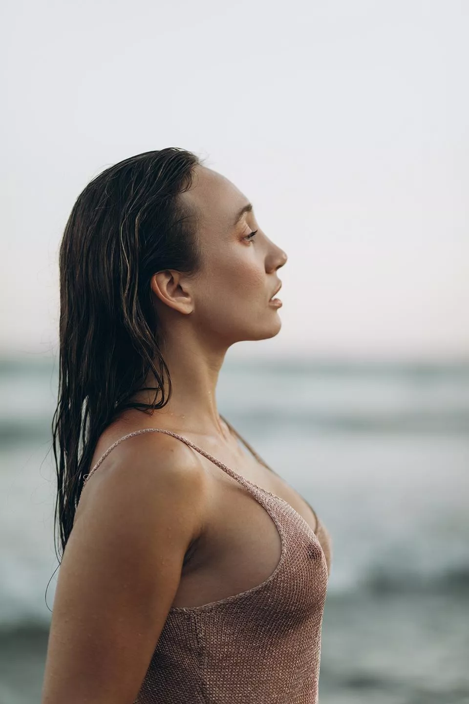 Seductive sideboob with a Mediterranean Sea view