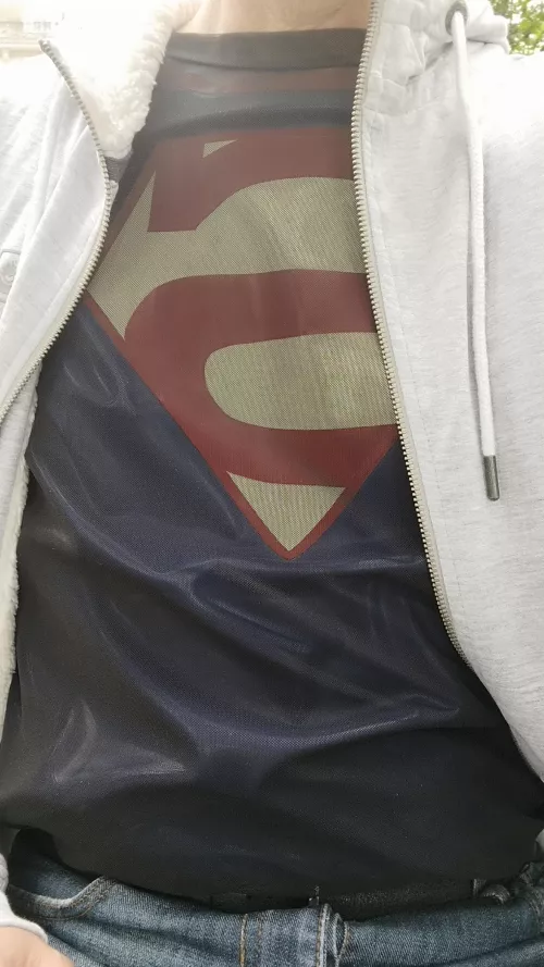 Out and about in my latex superman t-shirt 