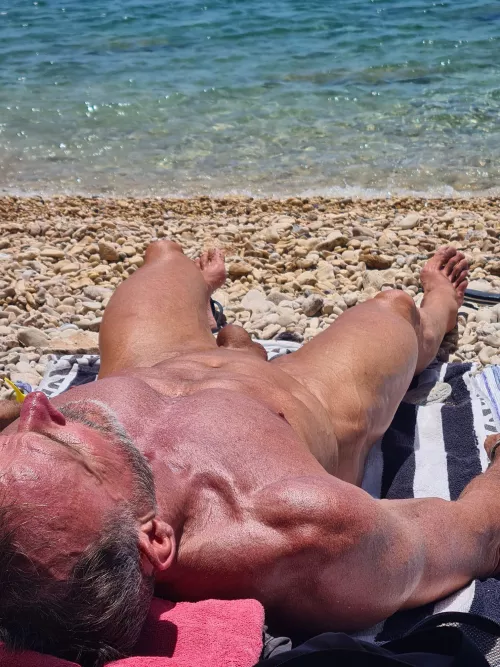 Asleep or dead, it was a hot day. Nude beaches are my thing, luckily I live near several 