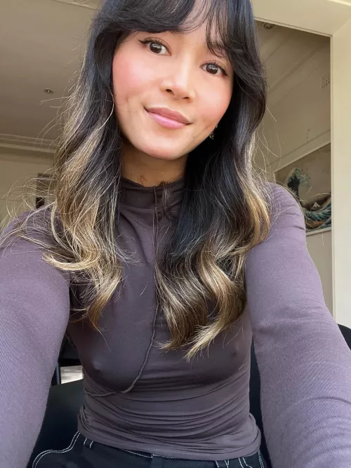 White tops and no bra are a classic combo, but black can be fun too