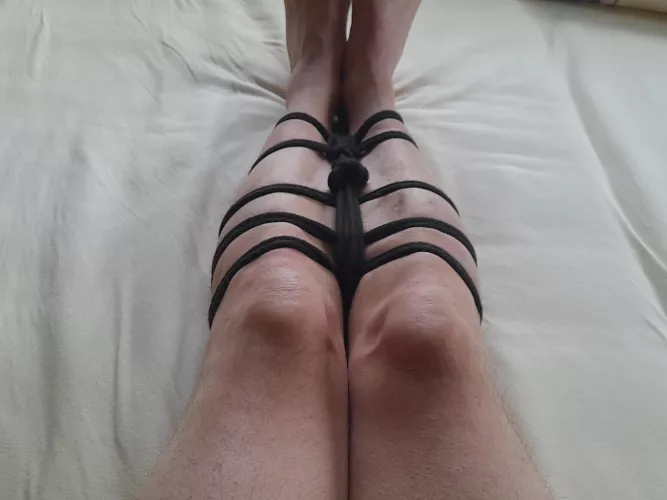 Legs tied together 
