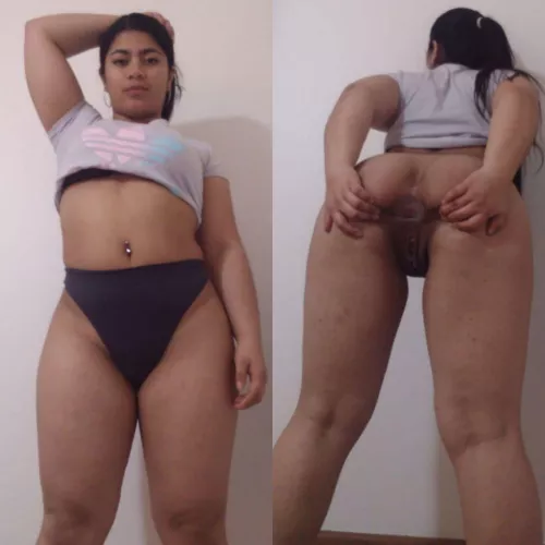 Spreading her cheeks to reveal her coal mine. You know, because it’s a dark hole. 