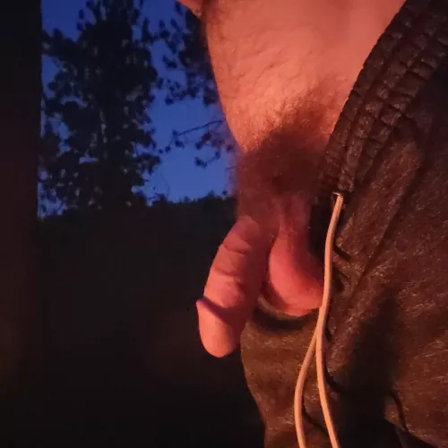 Glowing in the campfire light 