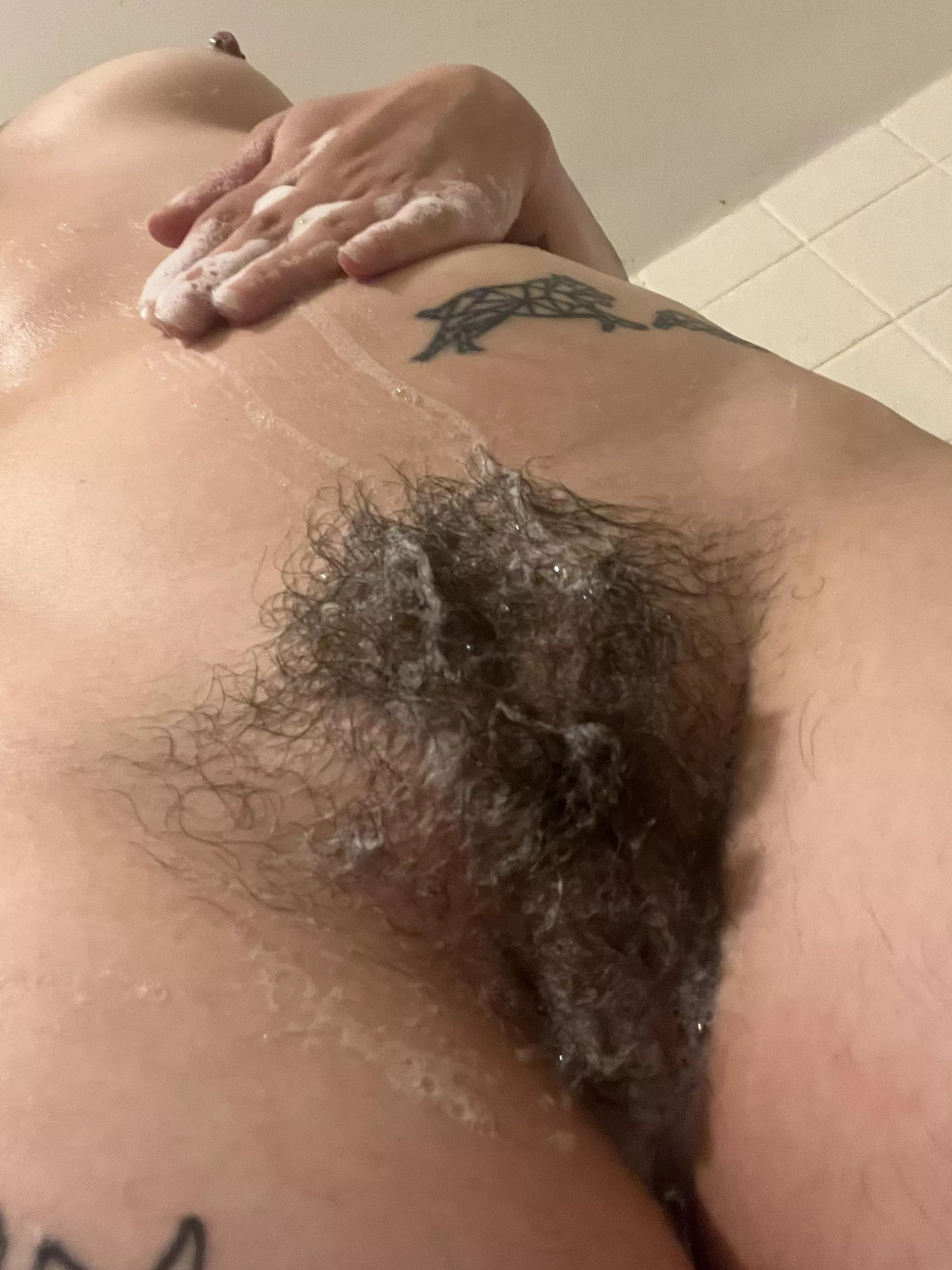 My yummy hairy pussy all soaped up in the shower is a sight to behold 