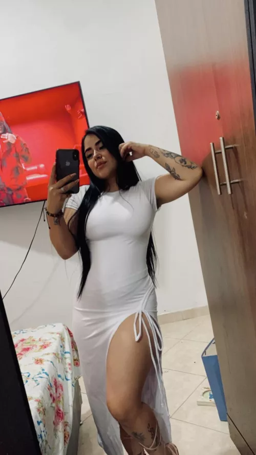 With my tight white dress