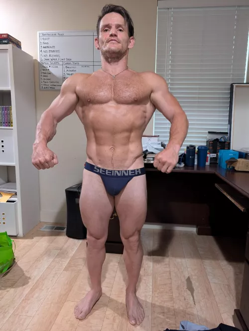 Practicing bodybuilding poses